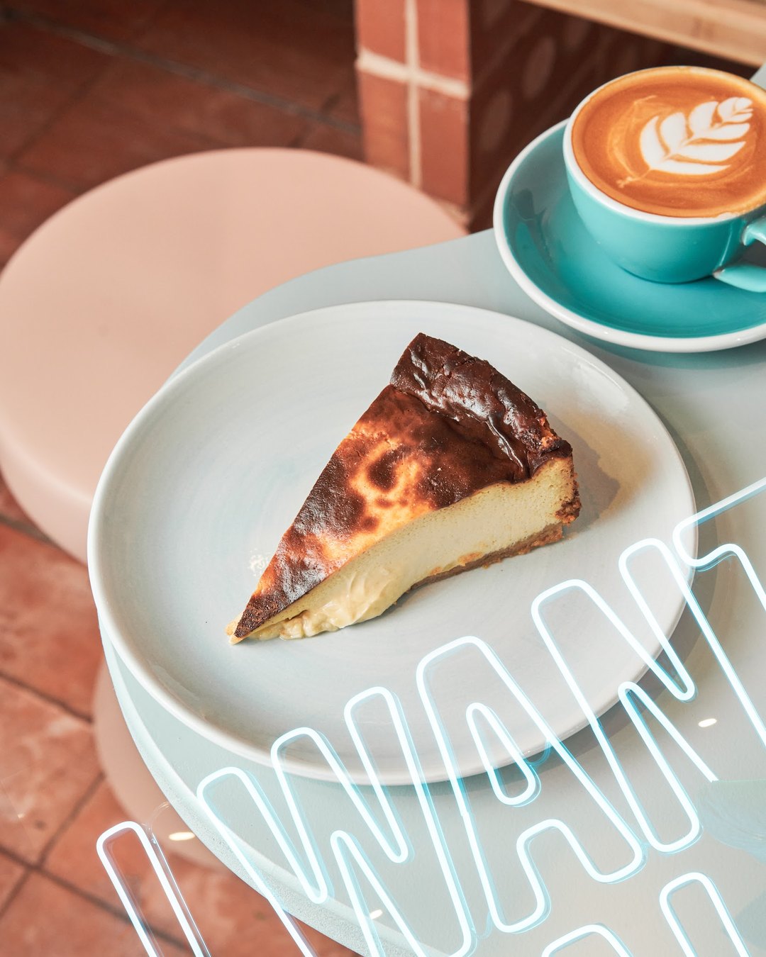 Afternoon tea spread with pastries, cake and coffee in Madrid